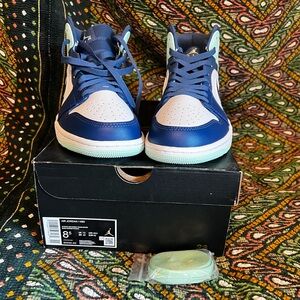 Nike Air Jordan 1 Mid in the "Mystic Navy and Mint Foam men’s size 8.5.